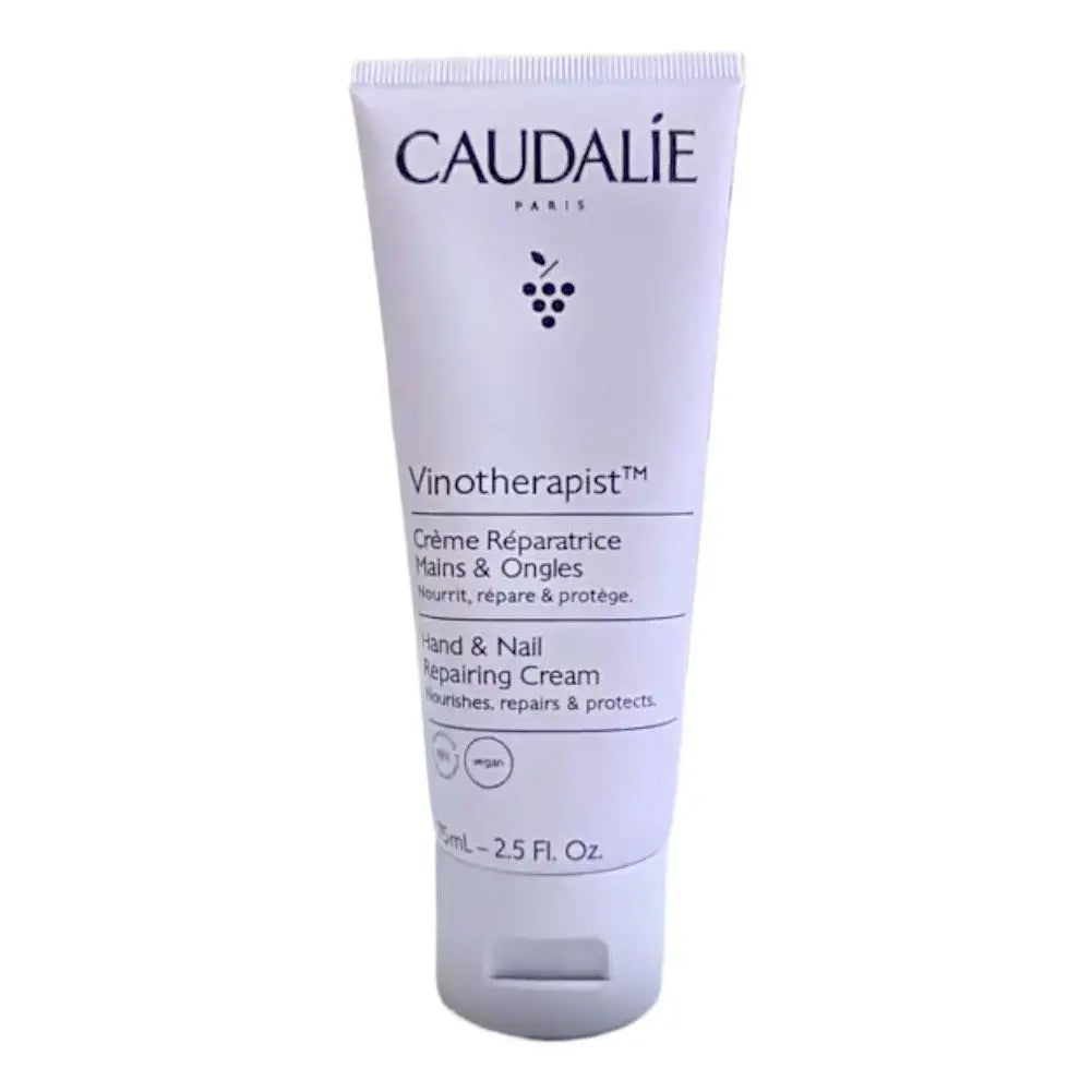 Caudéalé Vinotherapist hand and nail repairing cream tube on a white background