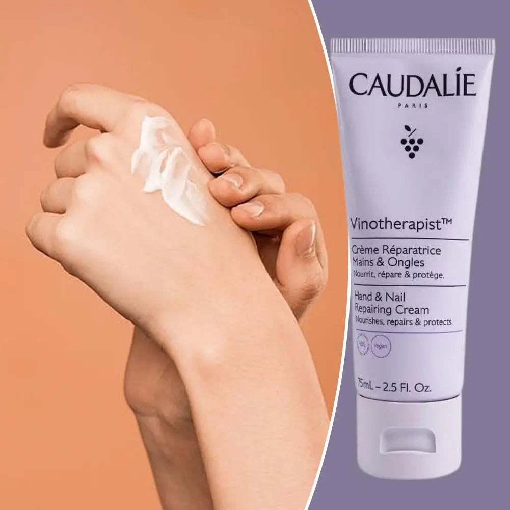 Caudélé hand cream being applied to hands with a purple background