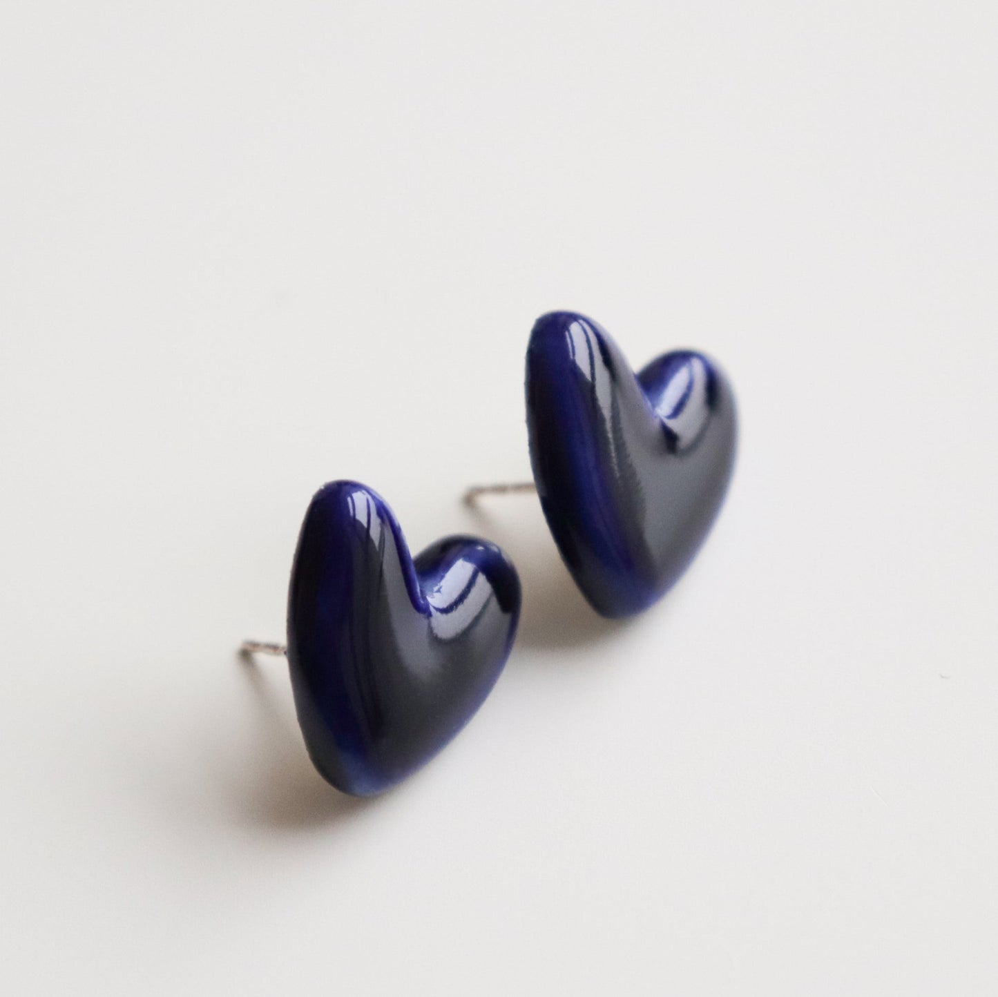 Porcelain Heart Studs -  Blue- Close-up of 925 sterling silver heart-shaped stud earrings
