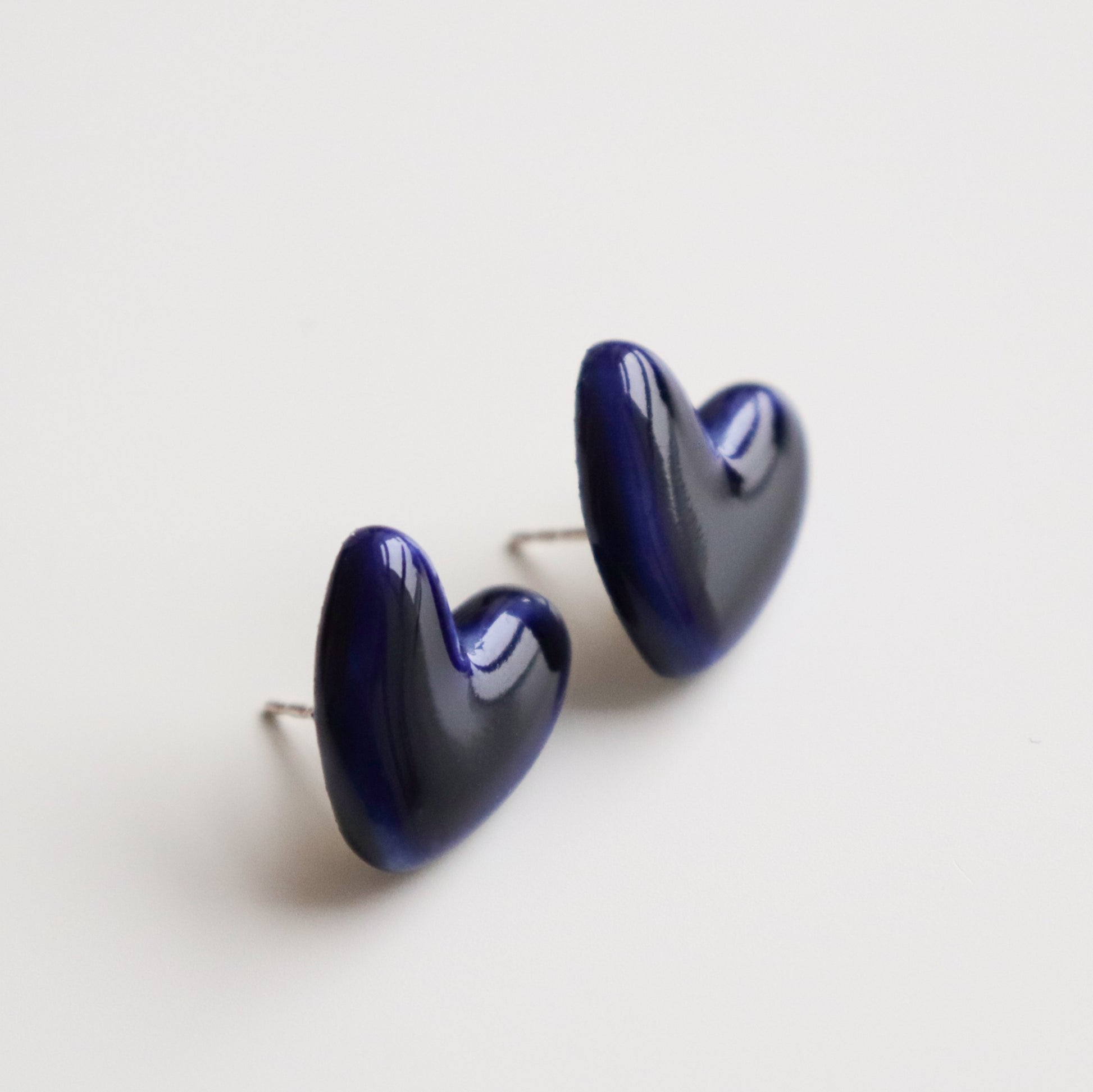 Porcelain Heart Studs -  Blue- Close-up of 925 sterling silver heart-shaped stud earrings